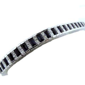 Princess Cut Diamonds & Baguette Cut Sapphire